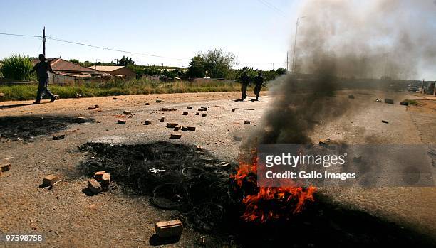 Protests over poor service delivery by Mamelodi residents turned violent on March 9, 2010 when protesting residents burnt tyres and other items and...