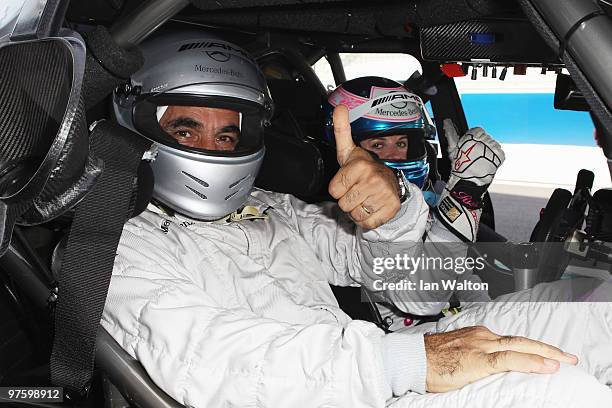 Mansour Bahrami and driver Susie Stoddart attend the Laureus Driving Experience for Good part of the Laureus Sports Awards 2010 at Yas Marina Circuit...