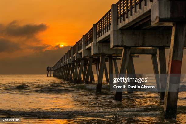 jacksonville beach fishing pier - jacksonville beach stock pictures, royalty-free photos & images