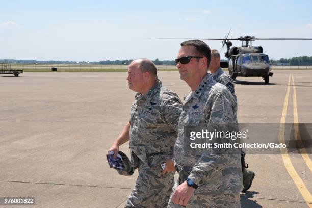 Air Force General Joseph L Lengyel and 181st Intelligence Wing commander Col Christopher Alderdice departing a UH-60 Black Hawk helicopter, Terre...