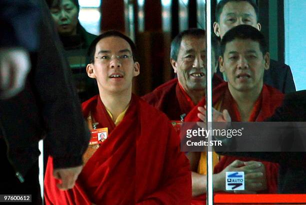 Gyaincain Norbu , the 11th Panchen Lama, together with his delegation arrive for a session of the Chinese People's Political Consultative Conference...