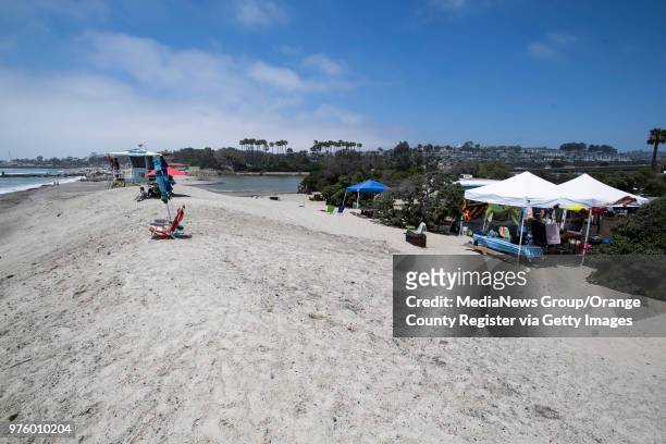 Berm separates the ocean with campsites at the edge of San Juan Creek at Doheny State Beach in Dana Point on Wednesday, June 13, 2018. High tides...