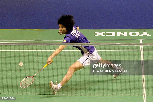 China's Yanjiao Jiang returns a shot to Malaysia's Mew Choo Wong during their woman's singles first round match at the Badminton All England Open...