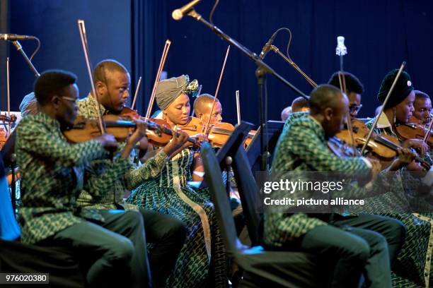 March 2018, Congo, Kinshasa: Musicians of the Orchester Symphonique Kimbanguiste de Kinshasa playing on their instruments. The majority of today's...