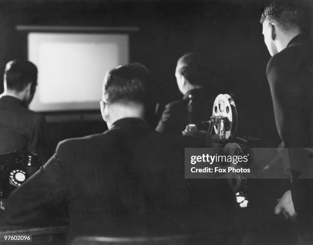 Kodak projector in use for a private screening, 1937.