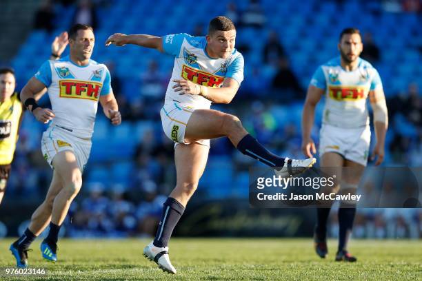 Ashley Taylor of the Titans kicks during the round 15 NRL match between the Canterbury Bulldogs and the Gold Coast Titans at Belmore Sports Ground on...