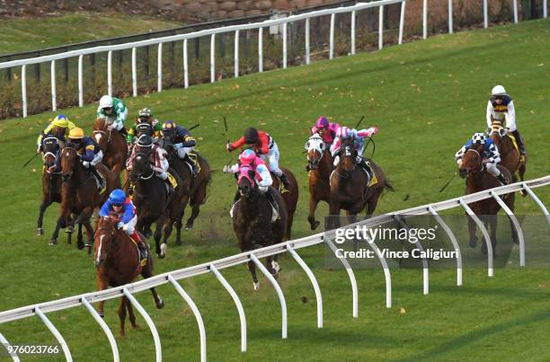 Craig Williams riding Magic Consol to win Race 9 , Travis Harrison Cup during Melbourne racing at Moonee Valley Racecourse on June 16, 2018 in...