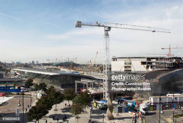 Construction of Westfield Stratford City and connecting walkway bridge to Stratford regional railway station, East London, UK.