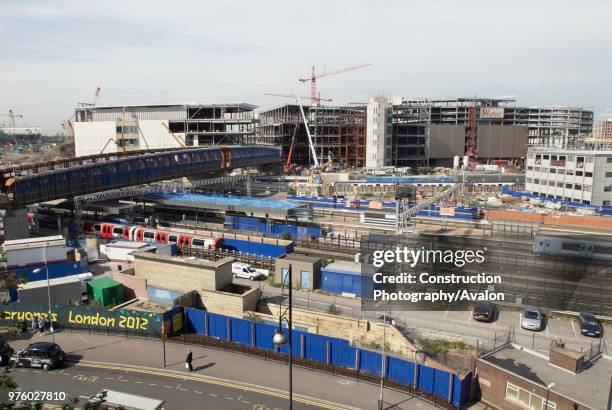 Construction of Westfield Stratford City and connecting walkway bridge to Stratford regional railway station, East London, UK.