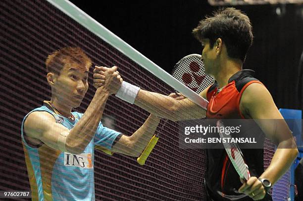 Malaysia's Chong Wei Lee celebrates his victory over India's Chetan Anand following their men's singles first round match at the Badminton All...