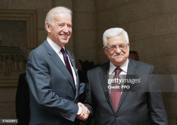 In this handout image provided by the Palestinian Press Office , US Vice President Joe Biden and Palestinian President Mahmoud Abbas shake hands...