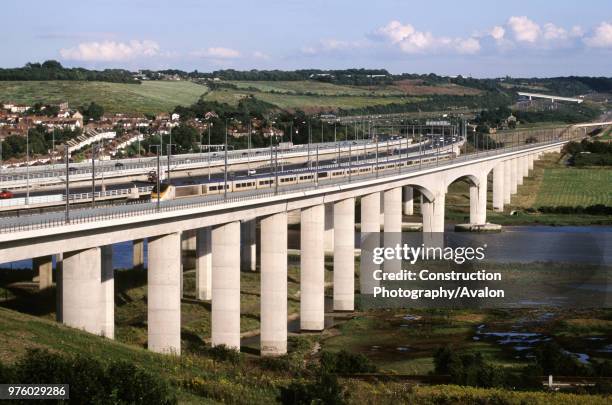 Kent, Medway motorway and high speed CTRL crossings with Eurostar train in transit.