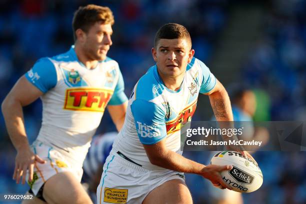 Ashley Taylor of the Titans looks to pass during the round 15 NRL match between the Canterbury Bulldogs and the Gold Coast Titans at Belmore Sports...