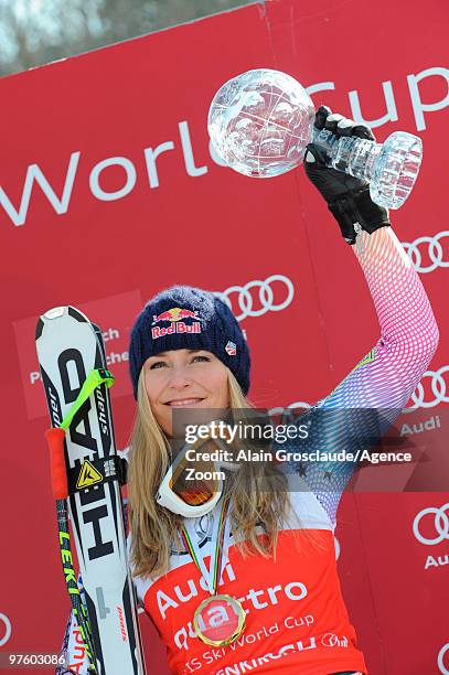 Lindsey Vonn of the USA takes the globe for the overall World Cup Downhill during the Audi FIS Alpine Ski World Cup Women's Downhill on March 10,...