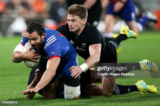Geoffrey Doumayrou of France is tackled by Beauden Barrett of New Zealand during the International Test match between the New Zealand All Blacks and...