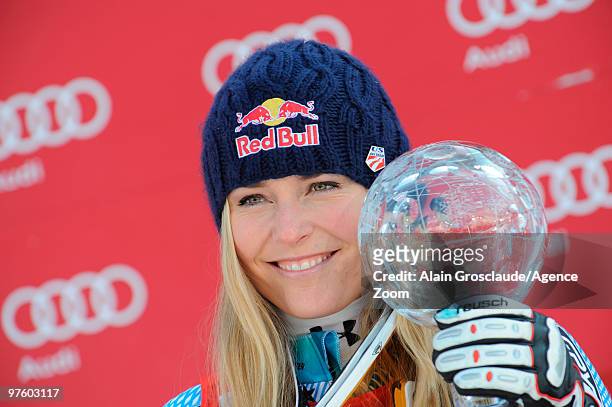 Lindsey Vonn of the USA takes the globe for the overall World Cup Downhill during the Audi FIS Alpine Ski World Cup Women's Downhill on March 10,...