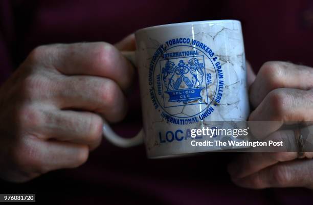 Alex Fattore has "worked the marshmallow line" for 37 years as he put it. He holds his coffee mug from his local union. -In September 2016, 400...