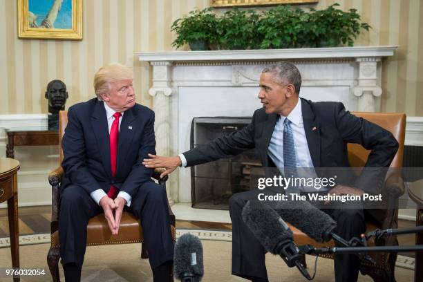 President Barack Obama shakes talks with President-elect Donald Trump in the Oval Office of the White House in Washington, Thursday, Nov. 10, 2016.