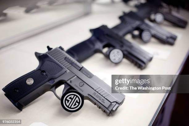 Sauer handguns are displayed for sale at Premier Shooting & Training Center in West Chester Township, Ohio. On Tuesday, February 27, 2017. TEACHERGUNS