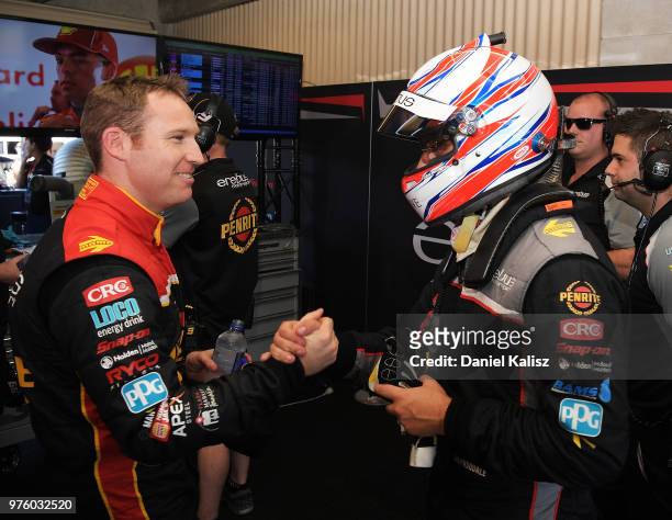 David Reynolds driver of the Erebus Penrite Racing Holden Commodore ZB celebrates with his team mate Anton de Pasquale driver of the Erebus...