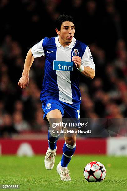 Fucile of Porto runs with the ball during the UEFA Champions League round of 16 match between Arsenal and FC Porto at the Emirates Stadium on March...