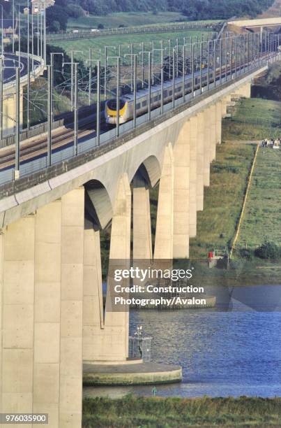 Medway high speed rail bridge - Eurostar TGV passing, Kent, UK.