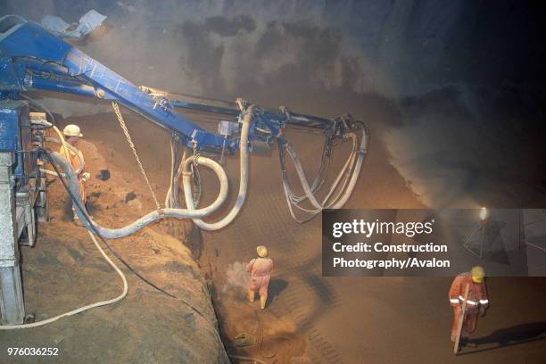 Robot Shotcrete Machine operating on tunnel invert, High speed rail line Nuremberg to Munich Germany .