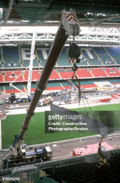 Liebherr mobile telescopiccrane lifting in precast seating beams Cardiff Millennium Stadium, Wales, United Kingdom.
