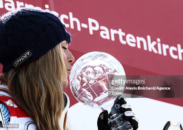 Lindsey Vonn of the USA takes the globe for the overall World Cup Downhill during the Audi FIS Alpine Ski World Cup Women's Downhill on March 10,...