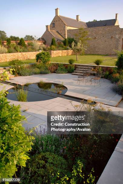 Walled country garden with a cascade and pool water feature Somerset UK.