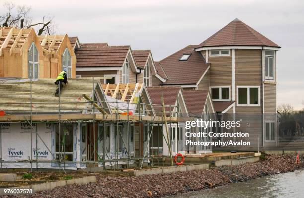 New England style houses at the Watermark lakeside development near Cirencester, Gloucestershire.