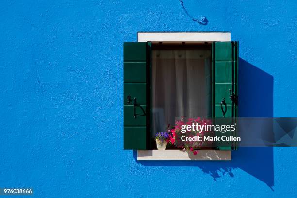 window on blue - mark cullen stockfoto's en -beelden