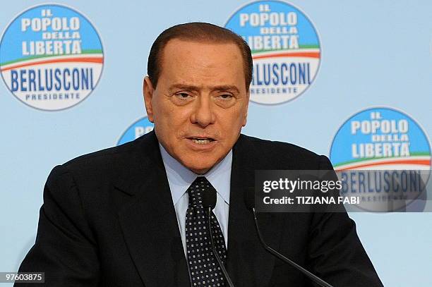 Italian Prime Minister and President of the Popolo della Liberta ruling party Silvio Berlusconi speaks during a press conference on March 10, 2010 at...