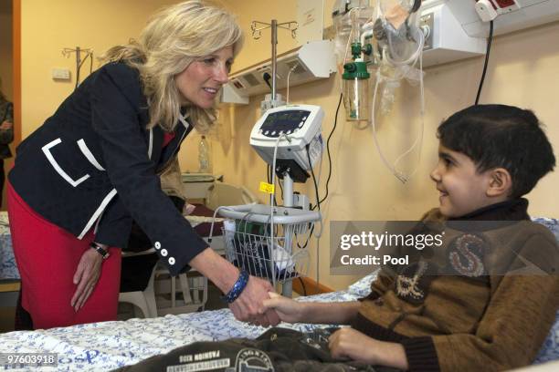 Jill Biden , wife of US Vice President Joe Biden, visits young Palestinian patients at the Augusta Victoria hospital on March 10, 2010 in East...