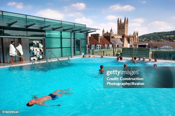 Swimmers enjoy The Thermal Bath Spa in Somerset UK.