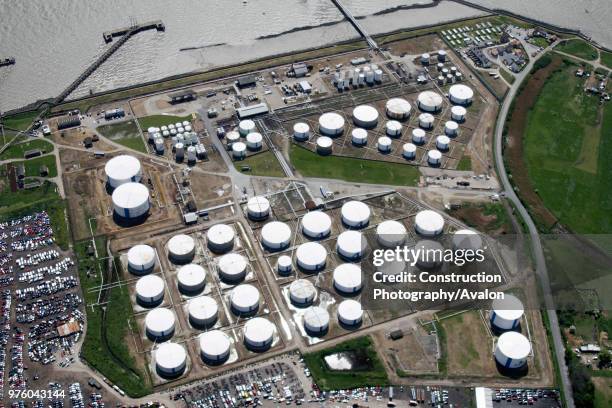 Aerial view south west of River Thames Estuary, BP Coryton Refinery, oil refineries, oil tanks, Thames Haven, east of Stanford-le-Hope, Essex, UK.
