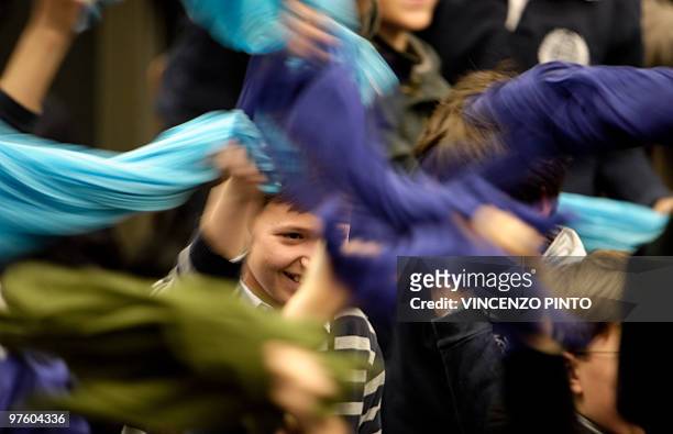 Children waves scarves during Pope Benedict XVI's weekly general audience on March 10, 2010 at the Paul VI hall at The Vatican. Pope Benedict XVI...
