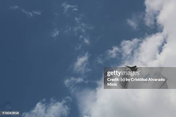 fighter jet with clouds background - guarico state stock pictures, royalty-free photos & images