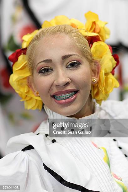 Hostess wearing traditional dress from the Dominican Republic attends the ITB Berlin travel trade show on March 10, 2010 in Berlin, Germany. The ITB,...