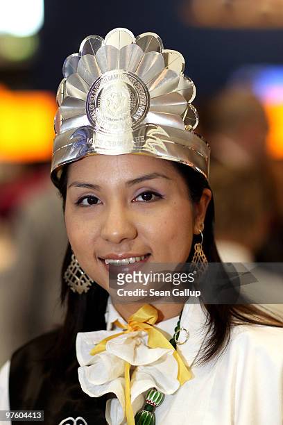 Hostess wearing traditional dress from the Cherokee tribe in Alaska attends the ITB Berlin travel trade show on March 10, 2010 in Berlin, Germany....