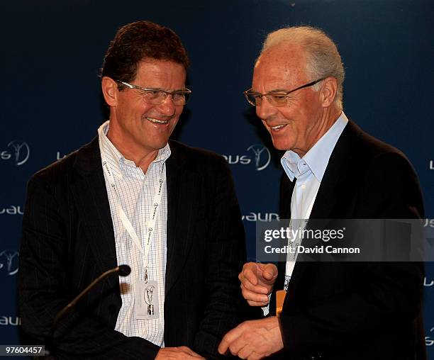 Fabio Capello and Franz Beckenbauer speak prior to the Laureus World Sports Awards 2010 at Emirates Palace Hotel on March 10, 2010 in Abu Dhabi,...