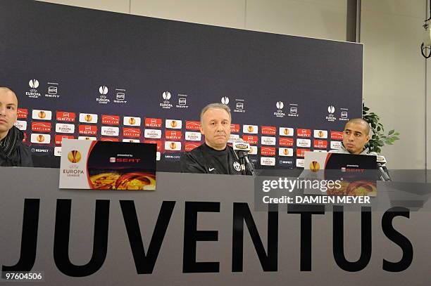 Juventus' coach Alberto Zaccheroni and French forward David Trezeguet listen during a press conference on the eve of their UEFA Europa League...