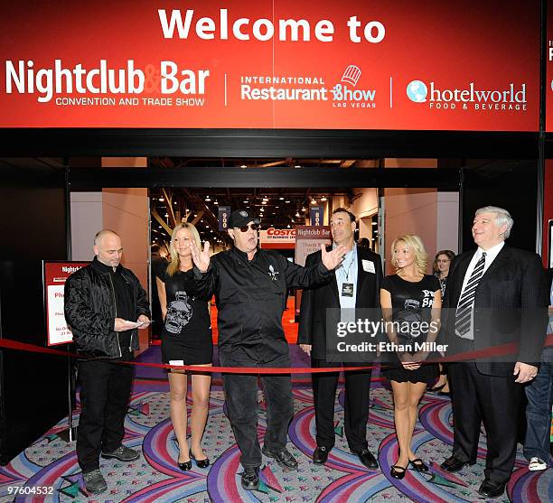Actor Dan Aykroyd , Nightclub & Bar Media Group and Questex Media Group President Jon Taffer and Questex CEO Kerry Gumas appear during a...
