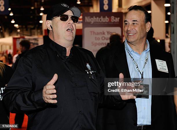 Actor Dan Aykroyd and Nightclub & Bar Media Group and Questex Media Group President Jon Taffer appear during a ribbon-cutting ceremony to open the...