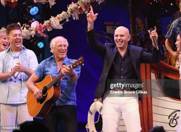 Jimmy Buffett and Pitbull onstage as Pitbull makes his broadway debut guest starring in the hit Jimmy Buffett Musical "Escape to Margaritaville" on...