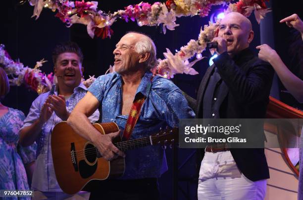 Jimmy Buffett and Pitbull onstage as Pitbull makes his broadway debut guest starring in the hit Jimmy Buffett Musical "Escape to Margaritaville" on...