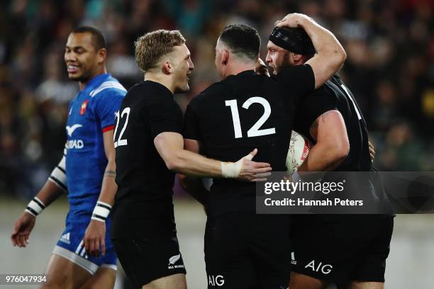 Damian McKenzie and Ryan Crotty of the All Blacks celebrate after Joe Moody of the All Blacks scored a try during the International Test match...