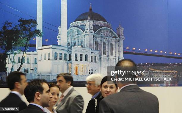 Trade fair visitor chat in at the stand of Turkey, this year's official partner country, at the ITB travel trade fair at the fair grounds in Berlin,...