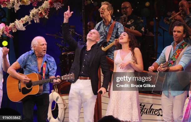 Jimmy Buffett and Pitbull onstage as Pitbull makes his broadway debut guest starring in the hit Jimmy Buffett Musical "Escape to Margaritaville" on...