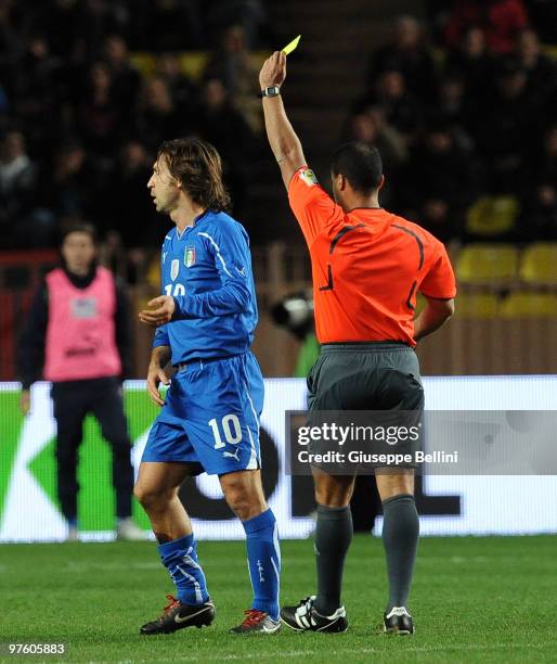 The referee Said Ennjimi shows the yellow card to Andrea Pirlo of Italy during the International Friendly match between Italy and Cameroon at Louis...